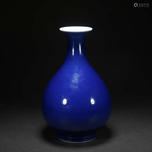 A blue glazed pear-shaped vase