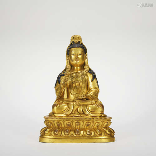 A gilt-bronze statue of Guanyin