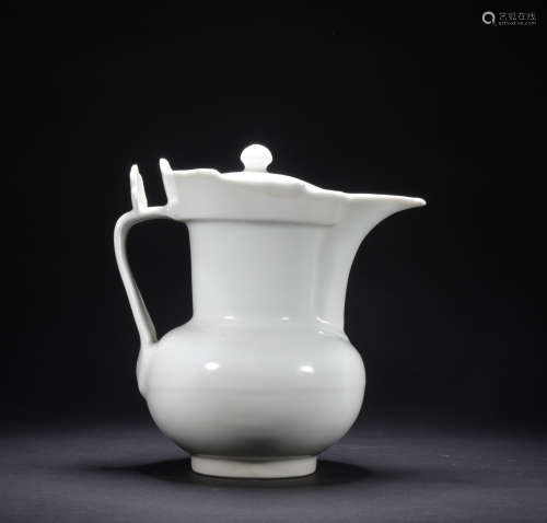 A white glazed pot