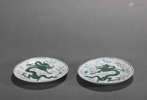 A pair of green glazed 'dragon' dish