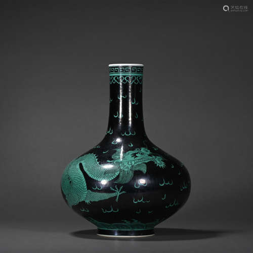 A blue ground green glazed 'dragon' globular vase