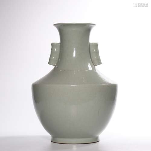 A celadon-glazed vase