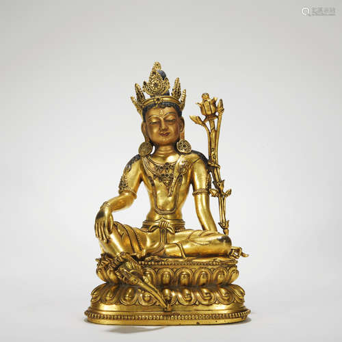 A gilt-bronze statue of Padmapani