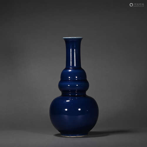 A blue glazed vase