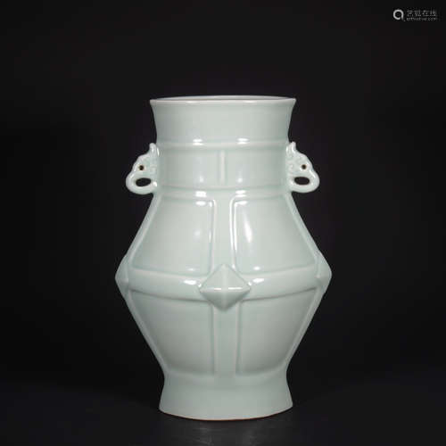 A celadon-glazed vase