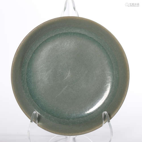 A celadon-glazed dish
