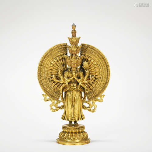 A gilt-bronze statue of Eleven sided Guanyin
