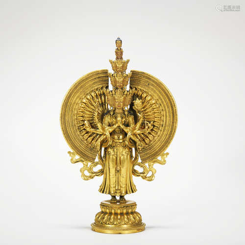 A gilt-bronze statue of Eleven sided Guanyin