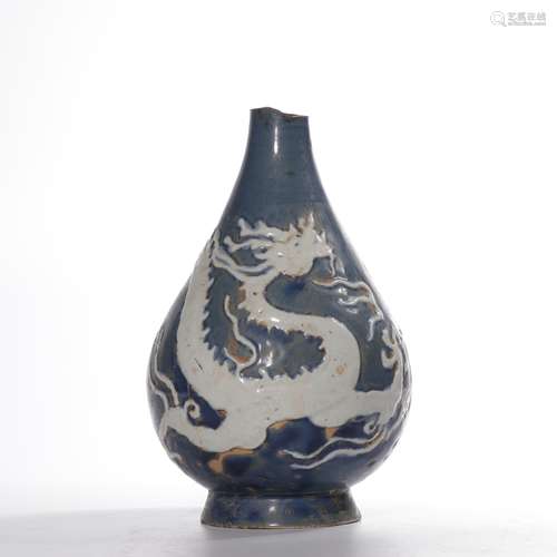 A blue glazed 'dragon' pear-shaped vase