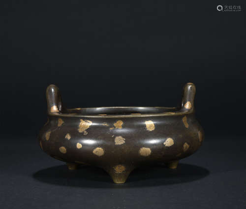 A bronze censer