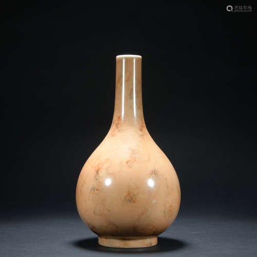 A wooden glazed vase