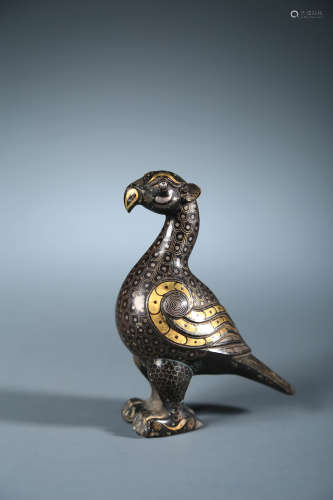 Bronze and gold and silver bird ornaments