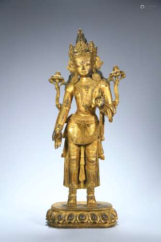 A gilt bronze statue of Guanyin