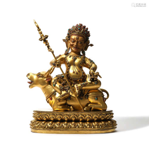 A Gilt-bronze Seated Protector