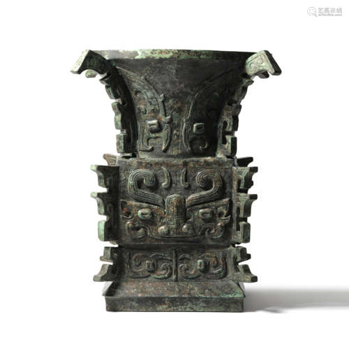 A Bronze Taotie MaskWine Vessel Gu