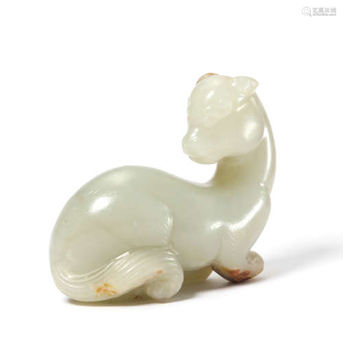 A Carved Jade Recumbent Mythical Beast