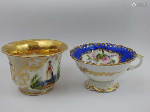 Deux tasses en porcelaine, l'une à décor d'une bretonne. Fêl...