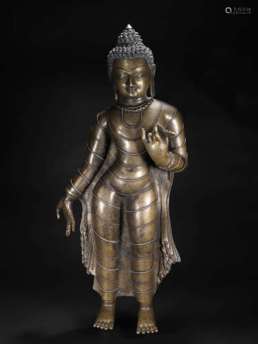 尼泊爾十四世紀合金銅嵌銀釋迦摩尼立像