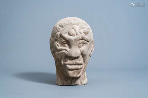 A Japanese stone head of a man formed by naked female bodies...