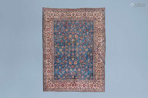 A large Persian Qom rug with floral design, wool on cotton, ...