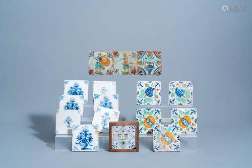 Sixteen Dutch delft polychrome and blue and white tiles with...