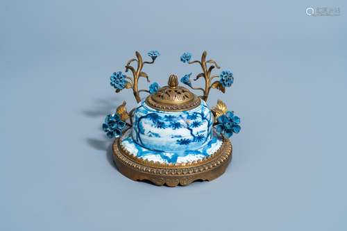 A Dutch Delft blue and white bronze mounted inkwell with por...