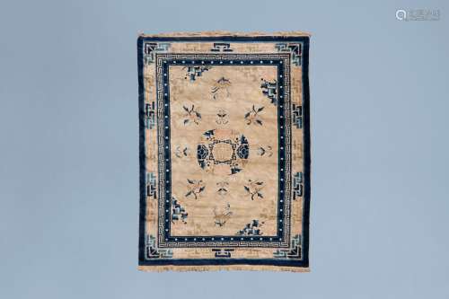 A Chinese 'Peking' rug with floral design, wool on cotton, f...