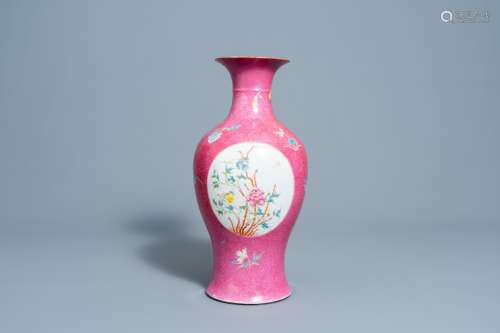 A Chinese famille rose ruby ground vase with floral design, ...