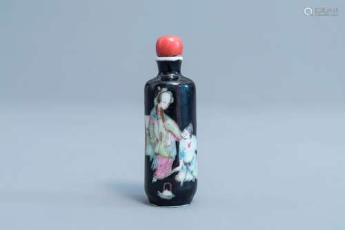 A Chinese famille rose black ground snuff bottle with figure...