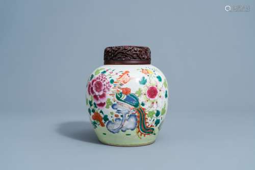 A Chinese famille rose jar and cover with a phoenix among bl...