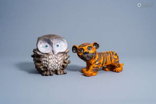 A tiger and an owl in polychrome glazed terracotta, Vandeweg...