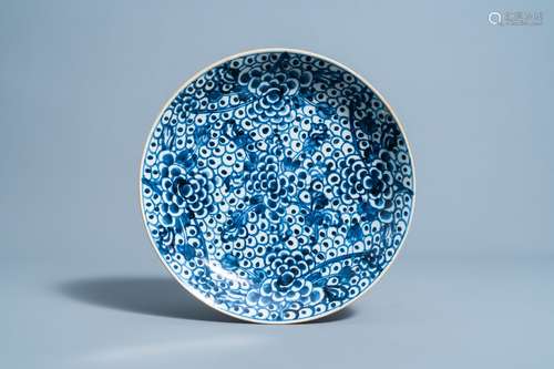 A Chinese blue and white dish with floral design, Kangxi