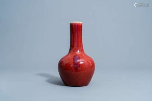 A Chinese monochrome sang de boeuf glazed vase, 19th C.