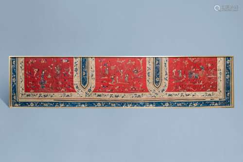 A Chinese framed embroidered altar cloth with playing childr...