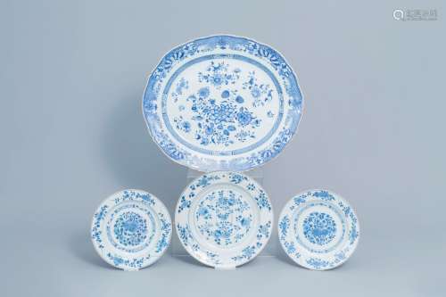 A large Chinese blue and white charger and three plates with...