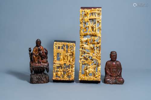 Two Chinese lacquered and gilt wood figures and two reticula...