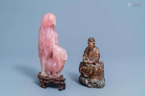 A Chinese polychrome and partly gilt wooden figure of Guanyi...