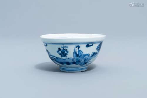 A Chinese blue and white bowl with figures in a landscape al...