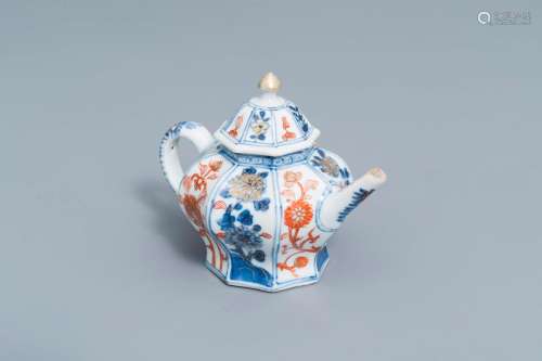 A Chinese octagonal Imari style teapot and cover with floral...