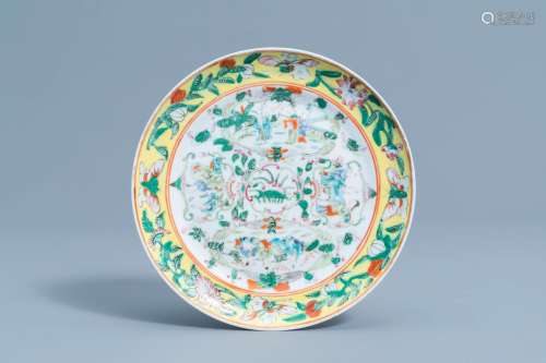 A Chinese famille rose plate with floral design and figures,...