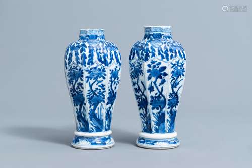 A pair of Chinese blue and white vases with floral design, K...