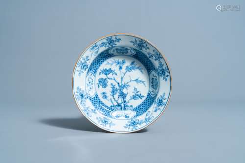 A Chinese blue and white deep plate with floral design, Yong...