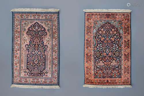 Two Oriental prayer rugs with floral design, silk on cotton,...