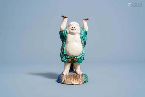 A Japanese Kutani laughing Buddha Hotei figure, Meiji, 19th/...