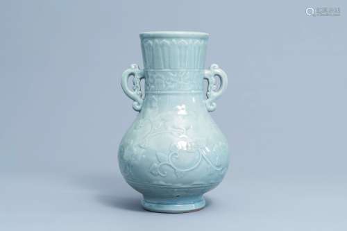 A Japanese celadon glazed 'lotus scroll' bottle vase, Edo/Me...