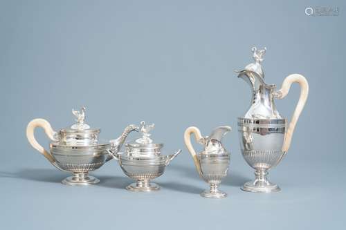 A four-piece silver Directoire style tea set with ivory hand...