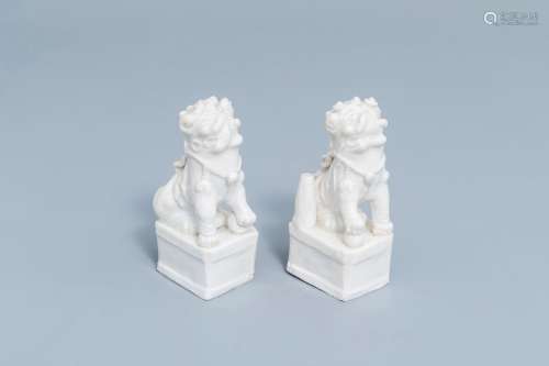 A pair of Chinese blanc de Chine joss-stick holders modelled...