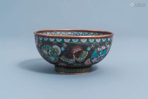 A Japanese cloisonne bowl with a phoenix, butterflies and fl...