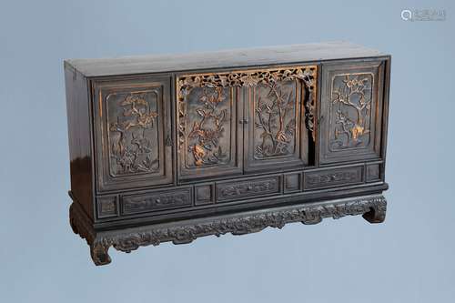 A Chinese lacquered, partly gilt and carved wooden 'four sea...