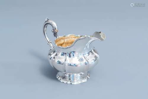 An English silver sauce boat, London, maker's mark W.B., 925...